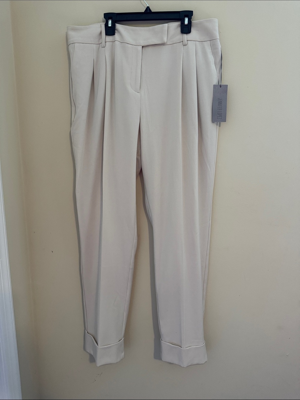 Jennifer Lopez Tailored Pleat Front Trousers in Cream